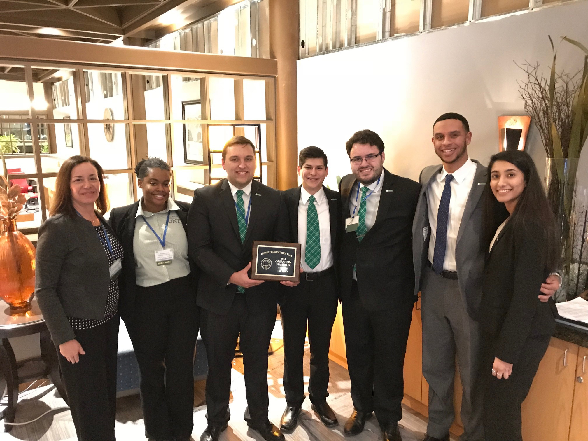 From left to right: Julie Willems-Espinoza, associate director of UNT's Center for Logistics Education and Research, and UNT logistics and supply chain management students Chelsea Jones, Woodrow Weaver, Carlos Castro, Joshua Intondi, Kristopher Henny and Pritti Gill.